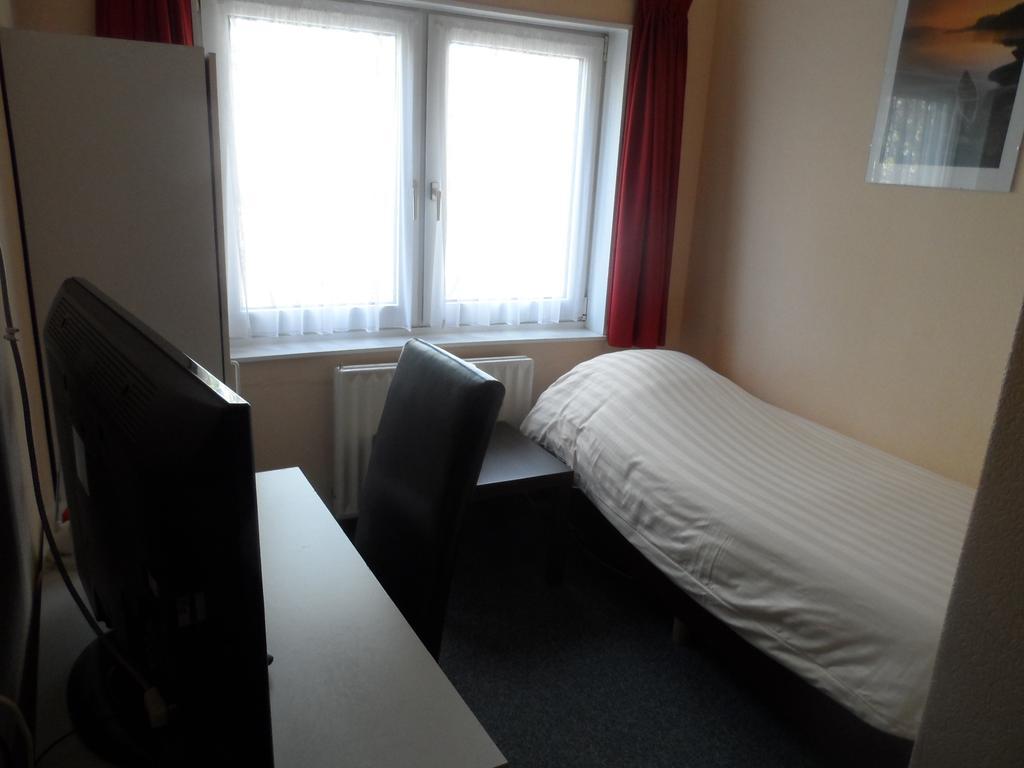 Hulsebos Hotel Zuidbroek Ruang foto